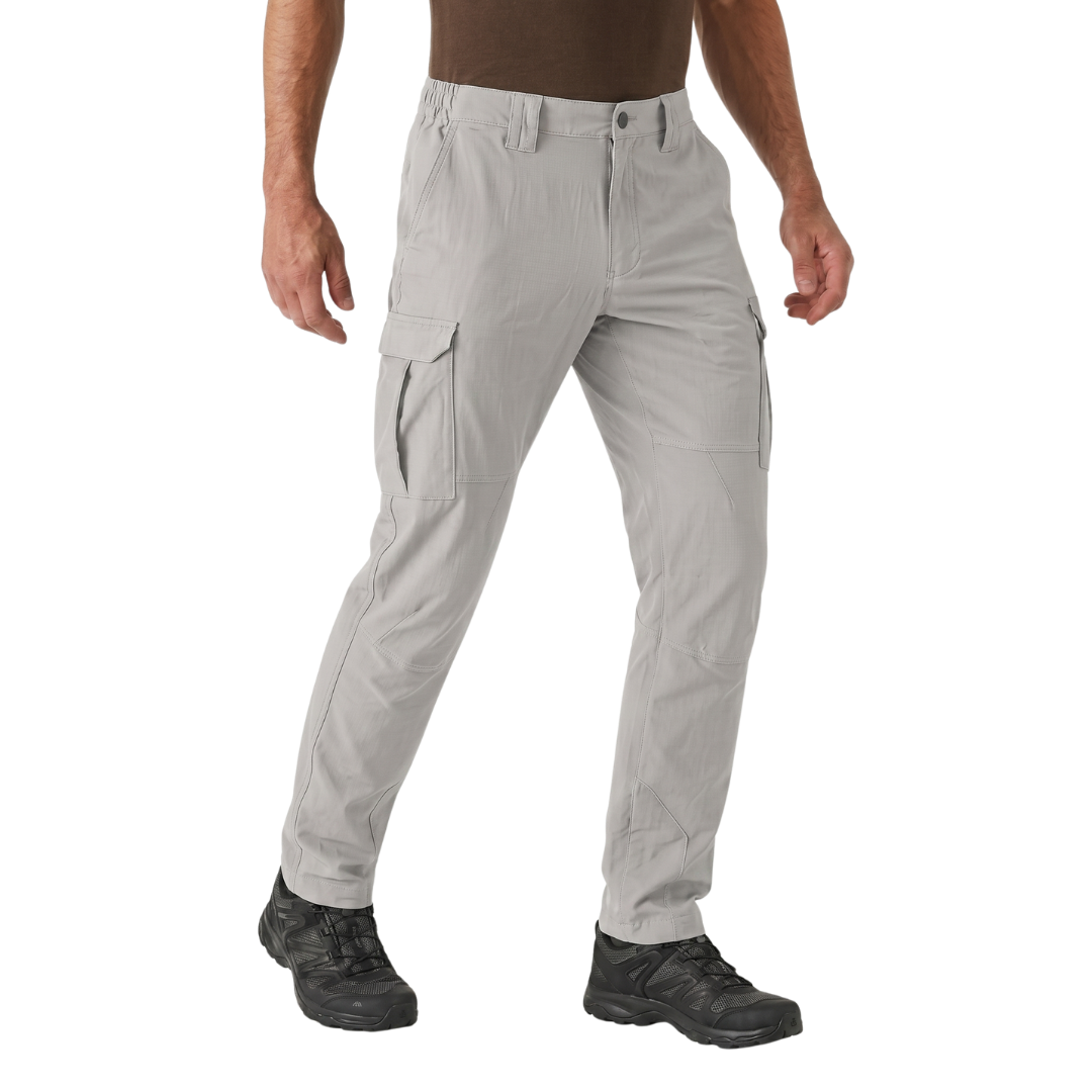 Model wearing Light Grey APEX Tactical Cargo in a studio shot