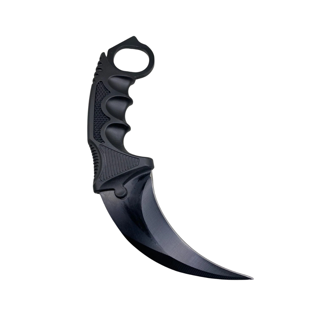 Close-up of karambit knife handle texture and ergonomic curved design