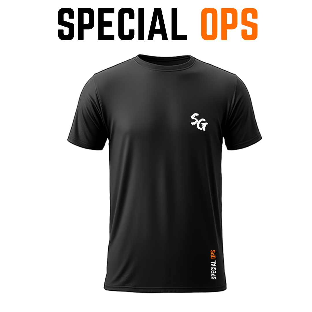 Front view of the black Special Ops tactical t-shirt, highlighting a small white "SG" logo on the left chest and a discreet vertical orange brand tag near the bottom hem.