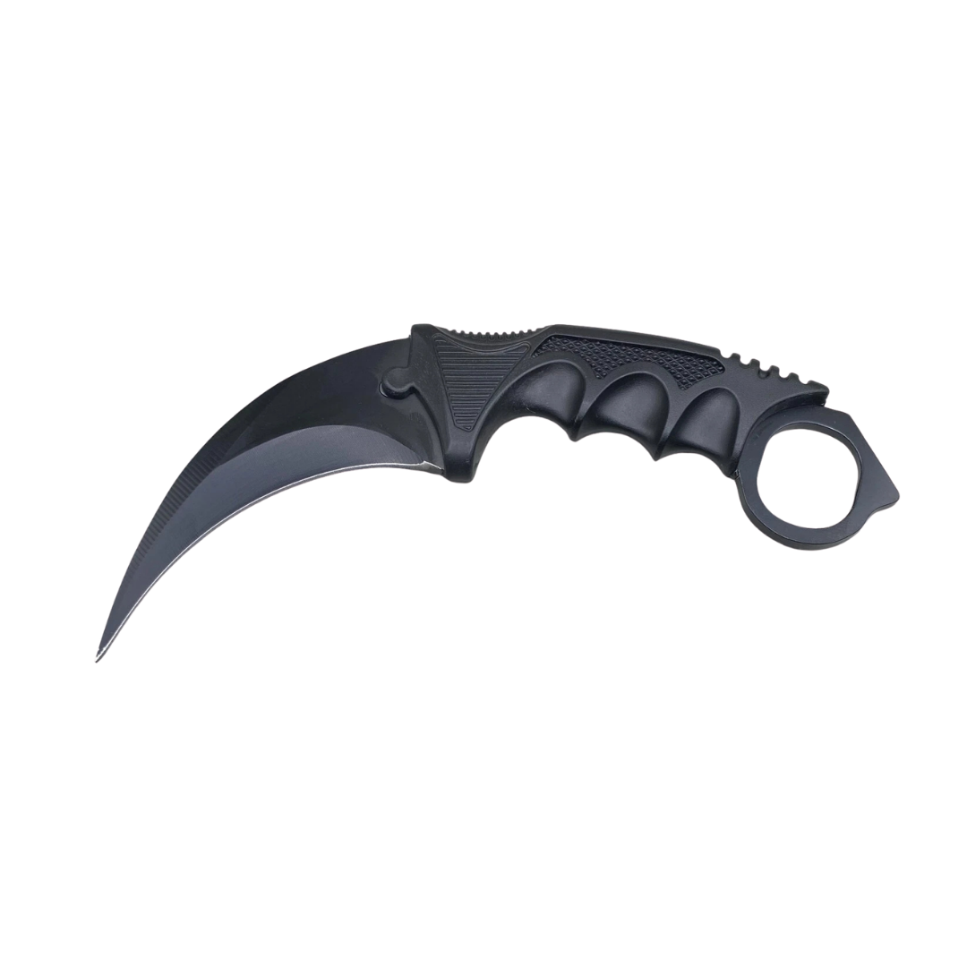 Karambit fixed blade knife showing finger ring and lanyard hole for secure grip