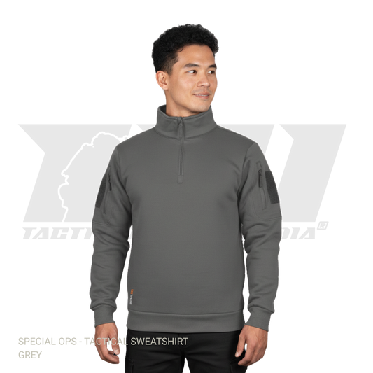 Grey tactical sweatshirt with sleeve zipper pockets and velcro patch panels for winter military operations